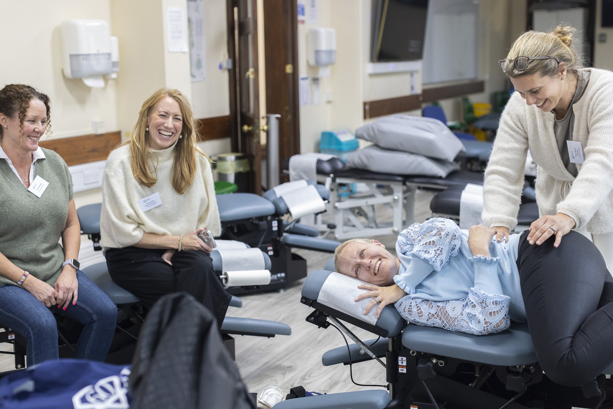 Alumni together in a workshop.