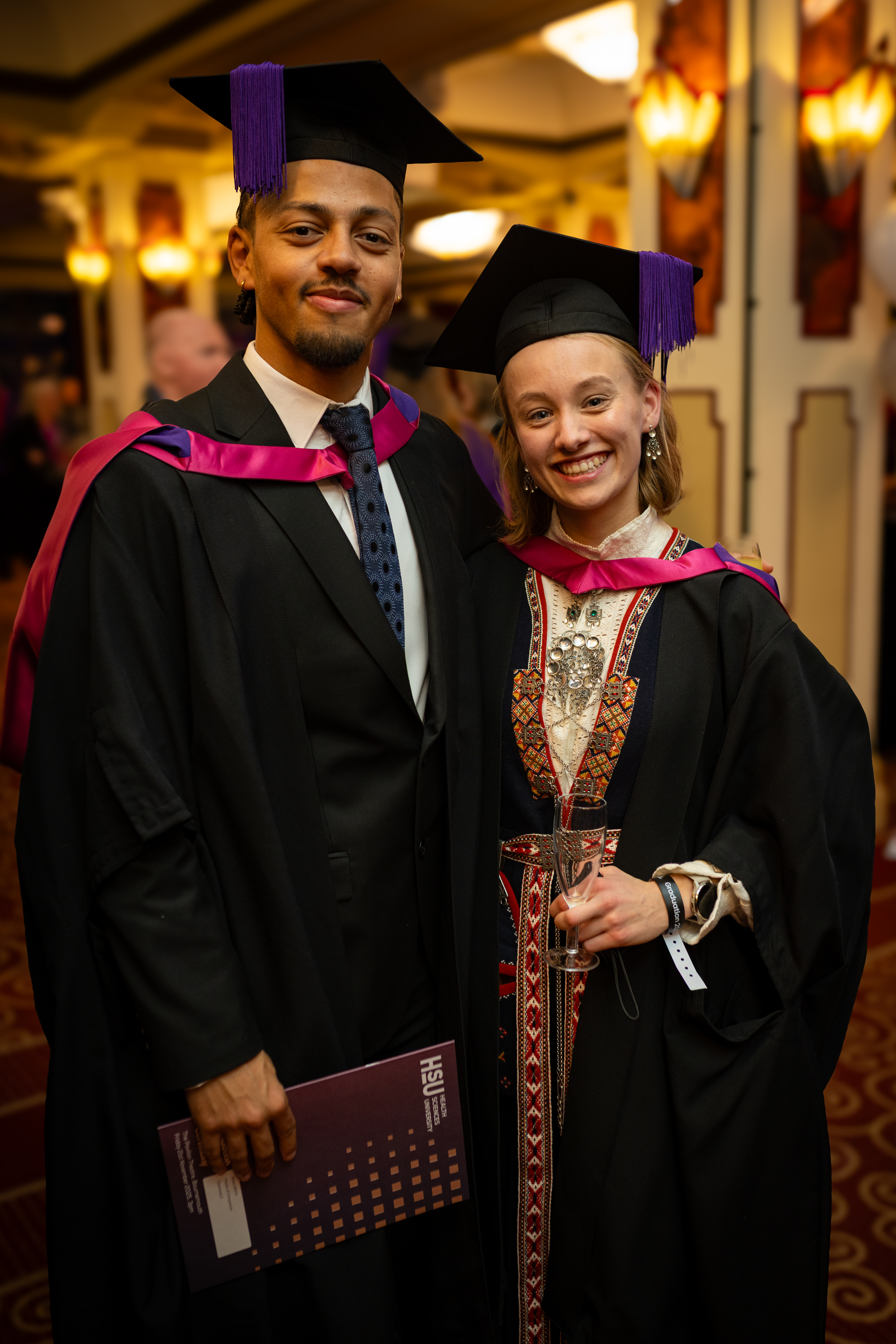 students celebrating graduation.