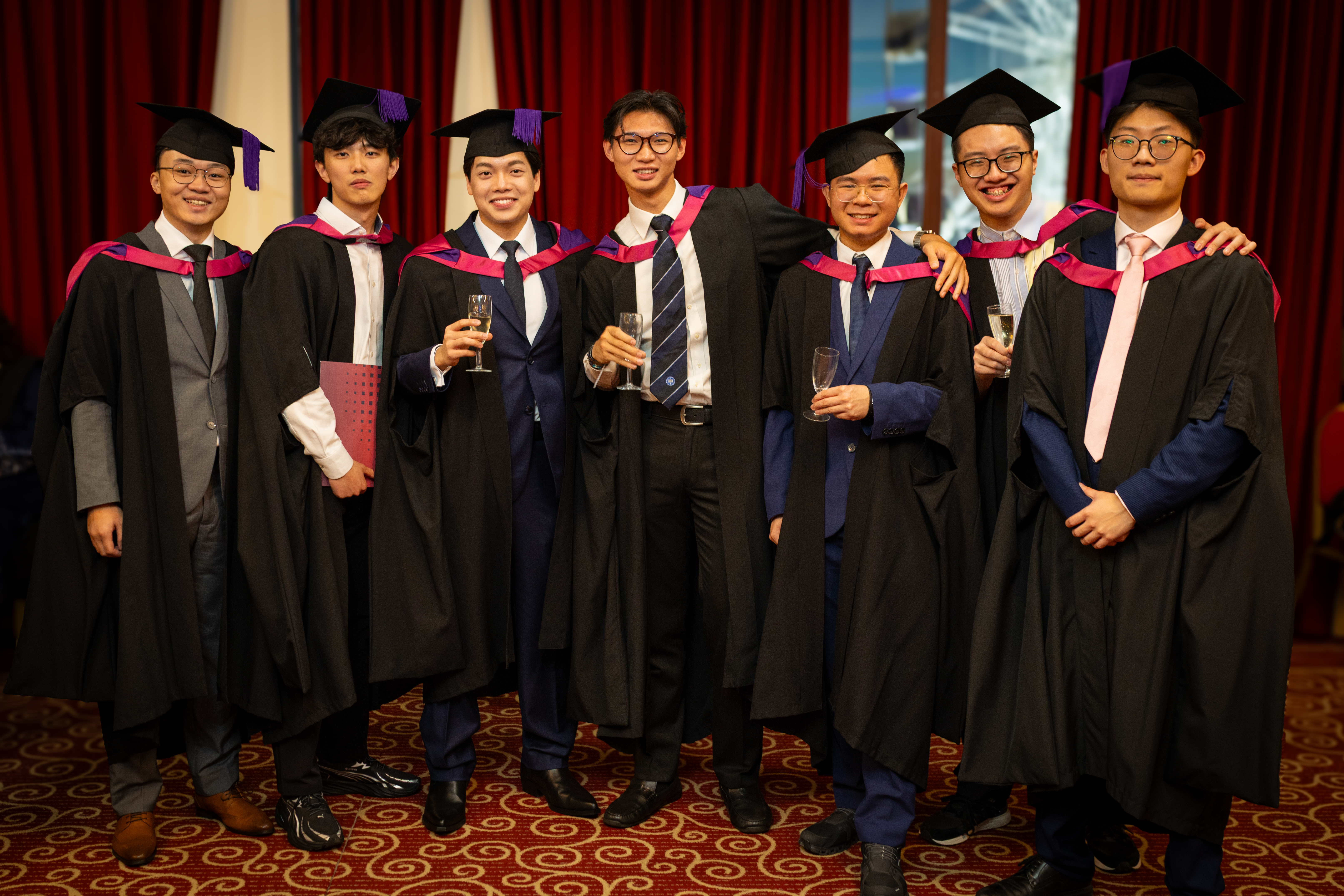 students celebrating graduation.