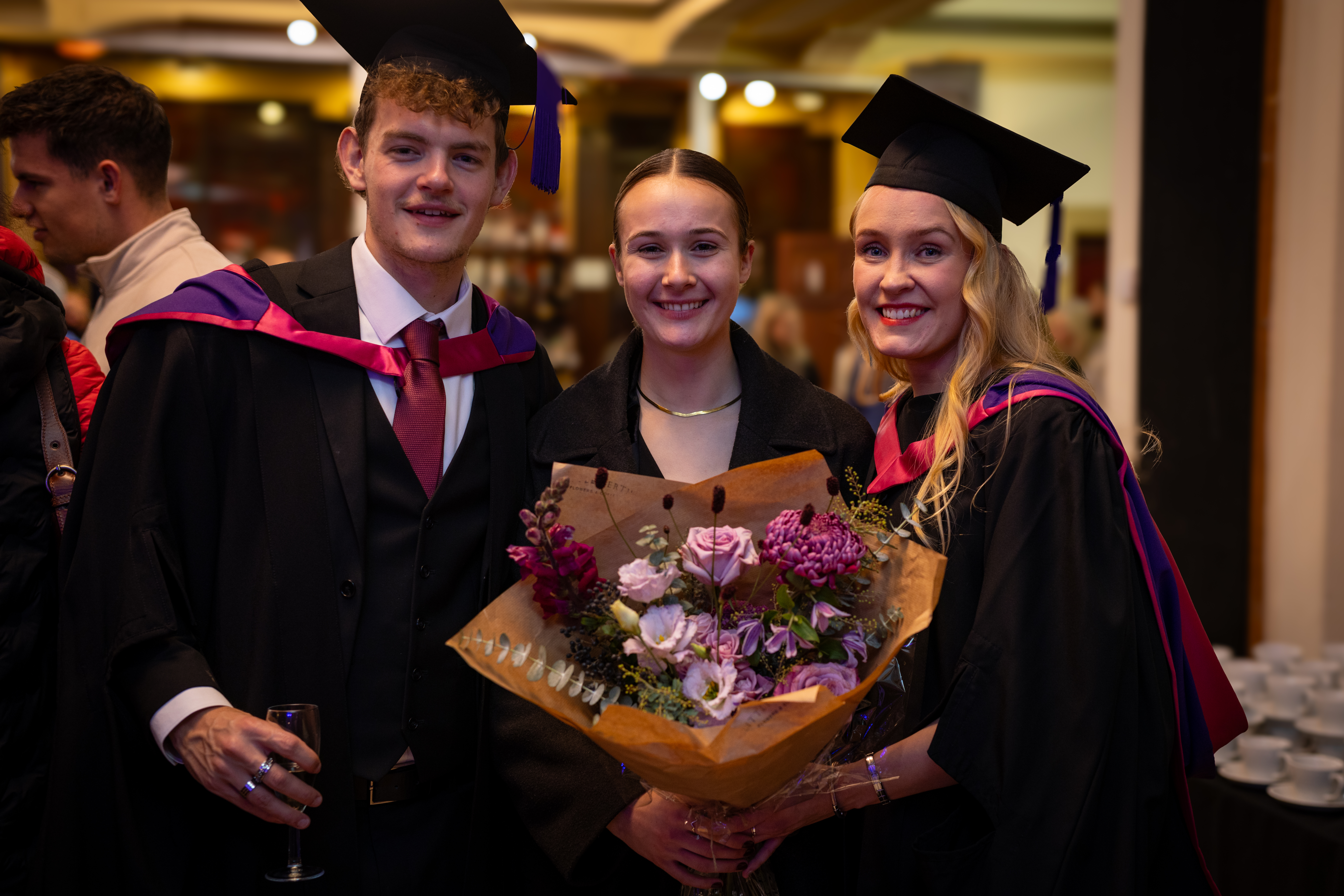 students celebrating graduation.